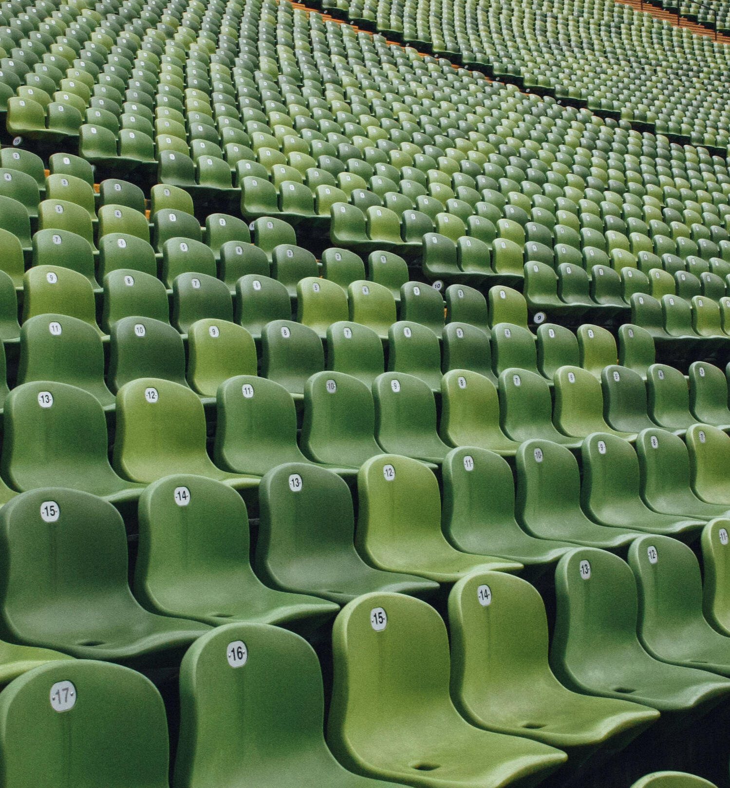 Green stadium seating at Olympic stadium in Germany, from German Advertising Paid Media Agency